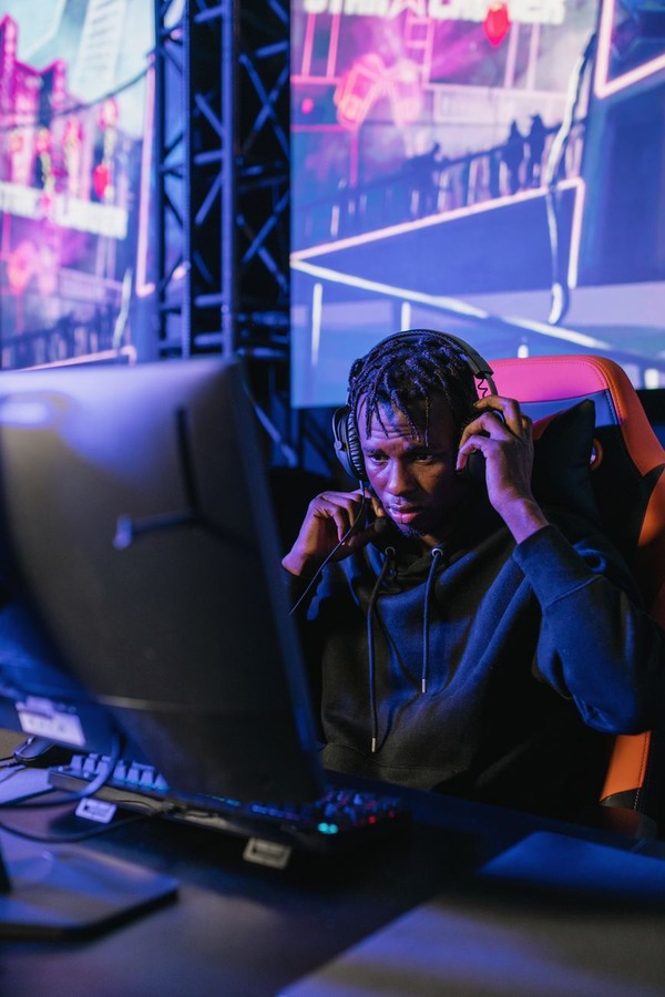 Player wearing headset in competitive match focus
